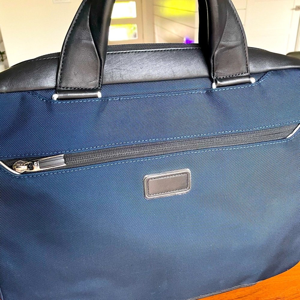 TUMI soft “briefcase” portfolio bag.